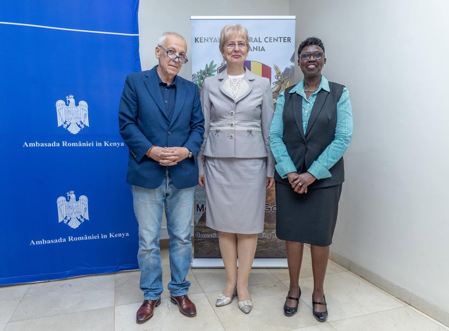 H.E. Gentiana Serbu, Romania's Ambassador to Kenya, with MaMa Doing Good and Kenya House representatives beside the Kenyan Cultural Centre banner, Nairobi